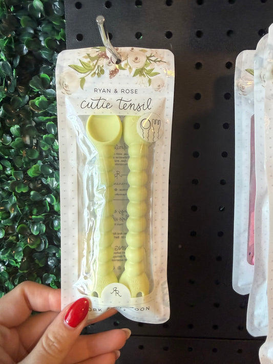 Yellow baby spoon
